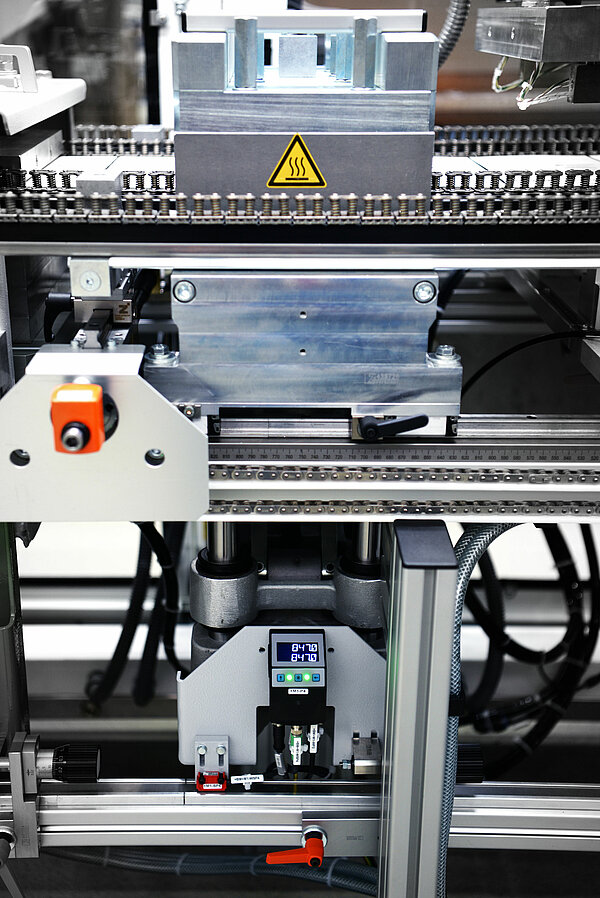 Indicateurs de position SIKO DA09S et AP10 sur la machine d'emballage