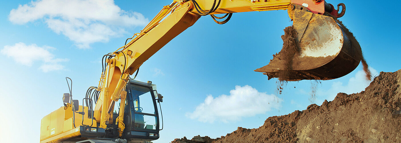 Yellow excavator at work