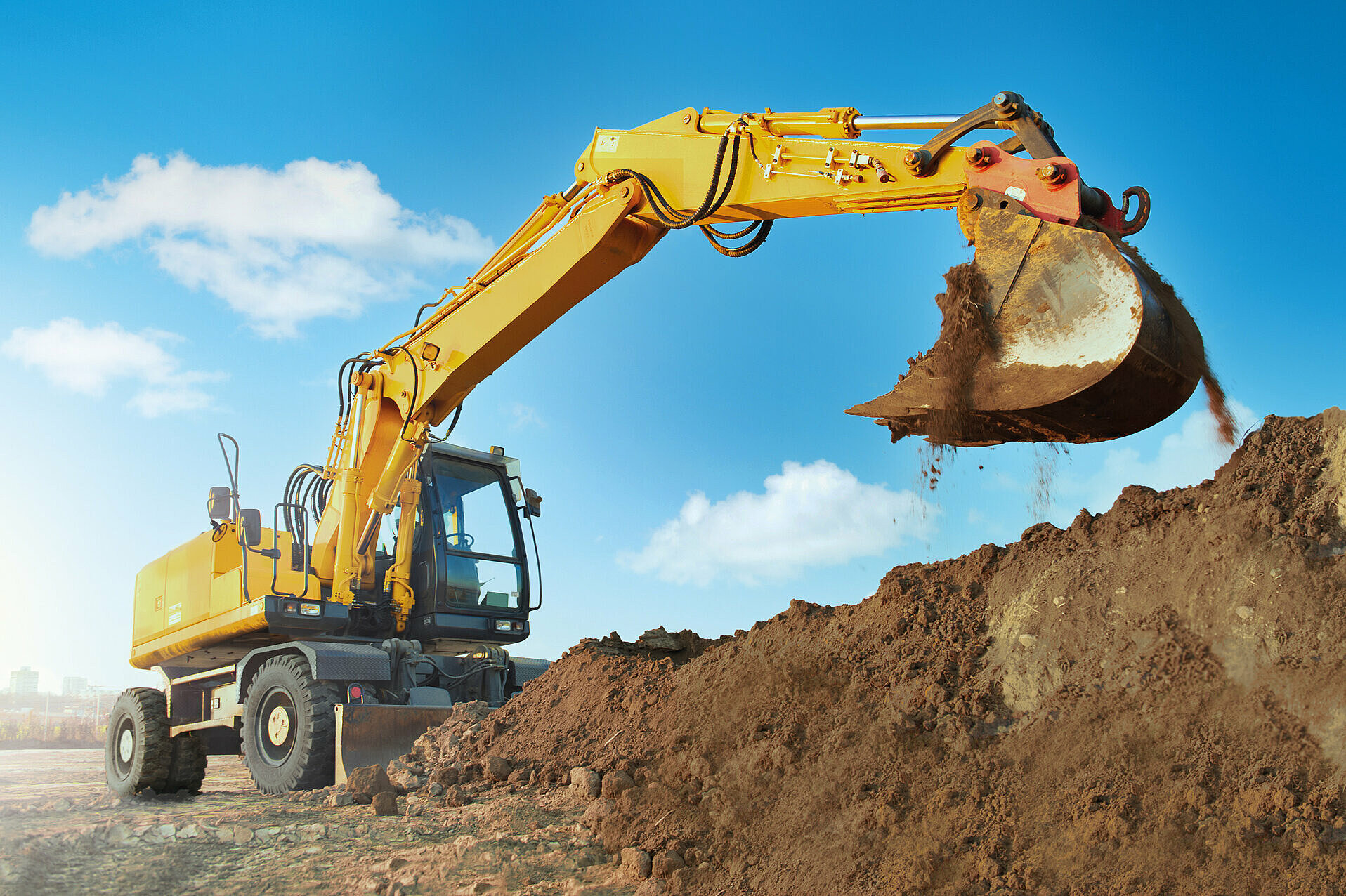 Yellow excavator at work